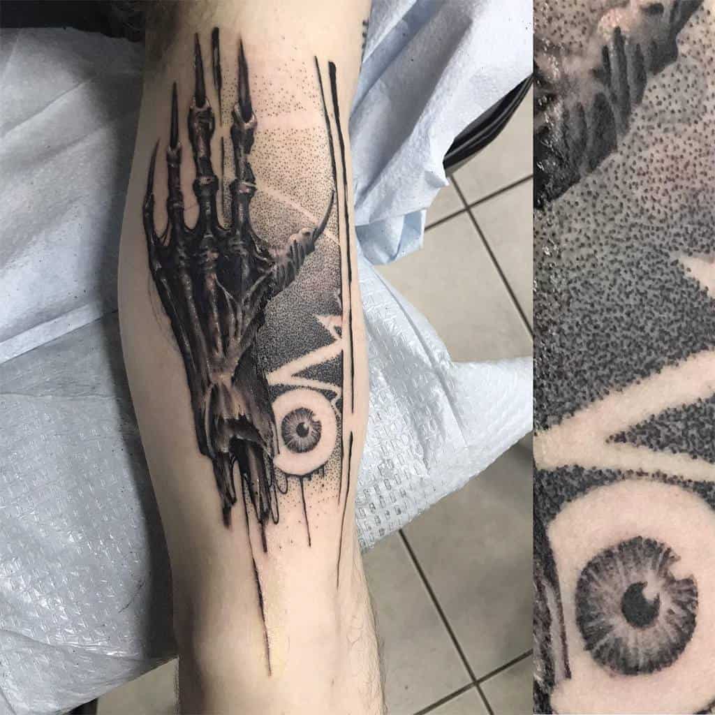 Realistic tattoo of the Hand of Vecna, a skeletal hand with intricate shading and mystical details