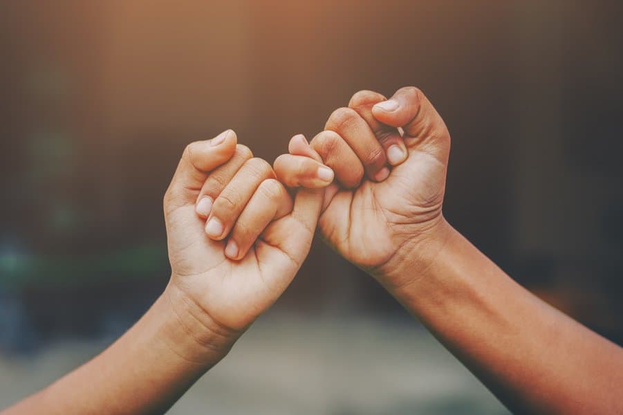 Hand to pinky swear