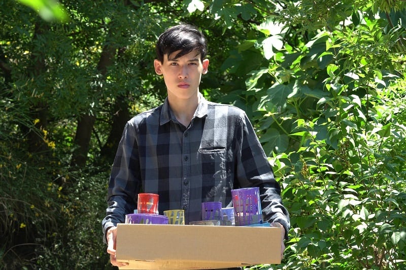 Handyman-Disposing-of-Leftover-Paint