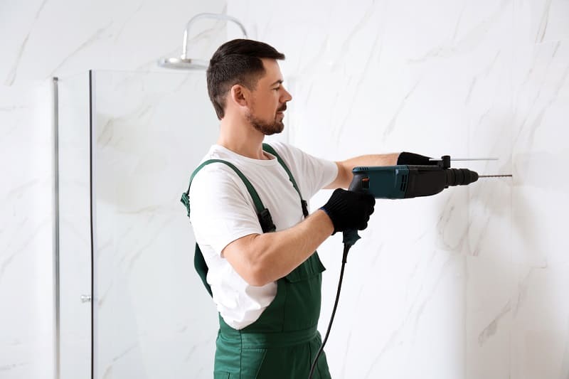 Handyman-Drilling-Through-a-Tile