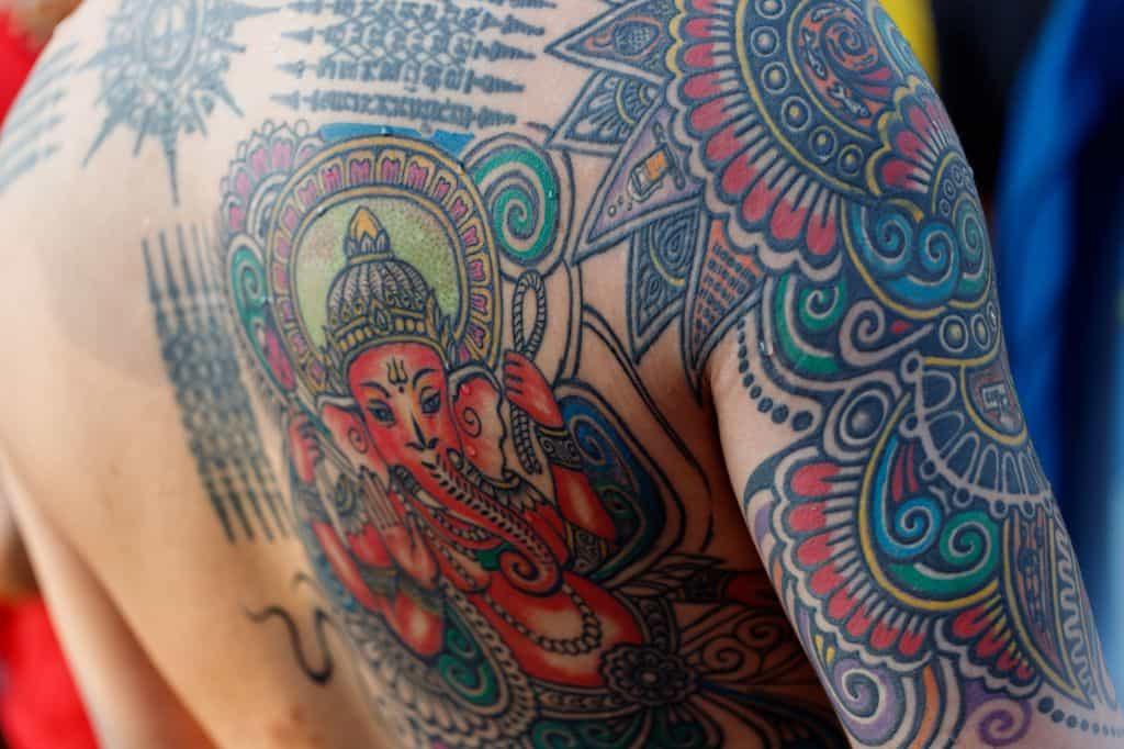 High Quality Traditional Colorful Stick And Poke Tatt Right Arm Back