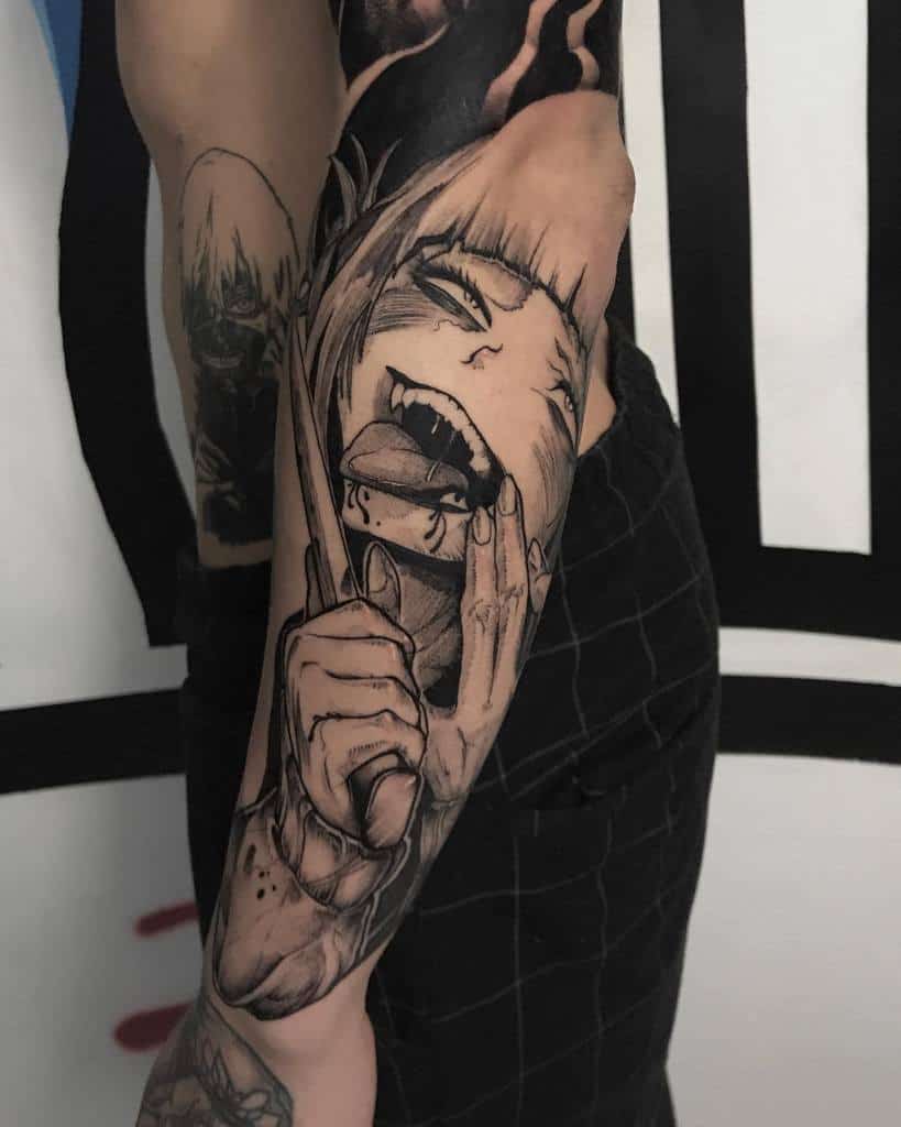 Black and grey tattoo of Himiko Toga from My Hero Academia, featuring her wild grin, sharp teeth, and intense shading