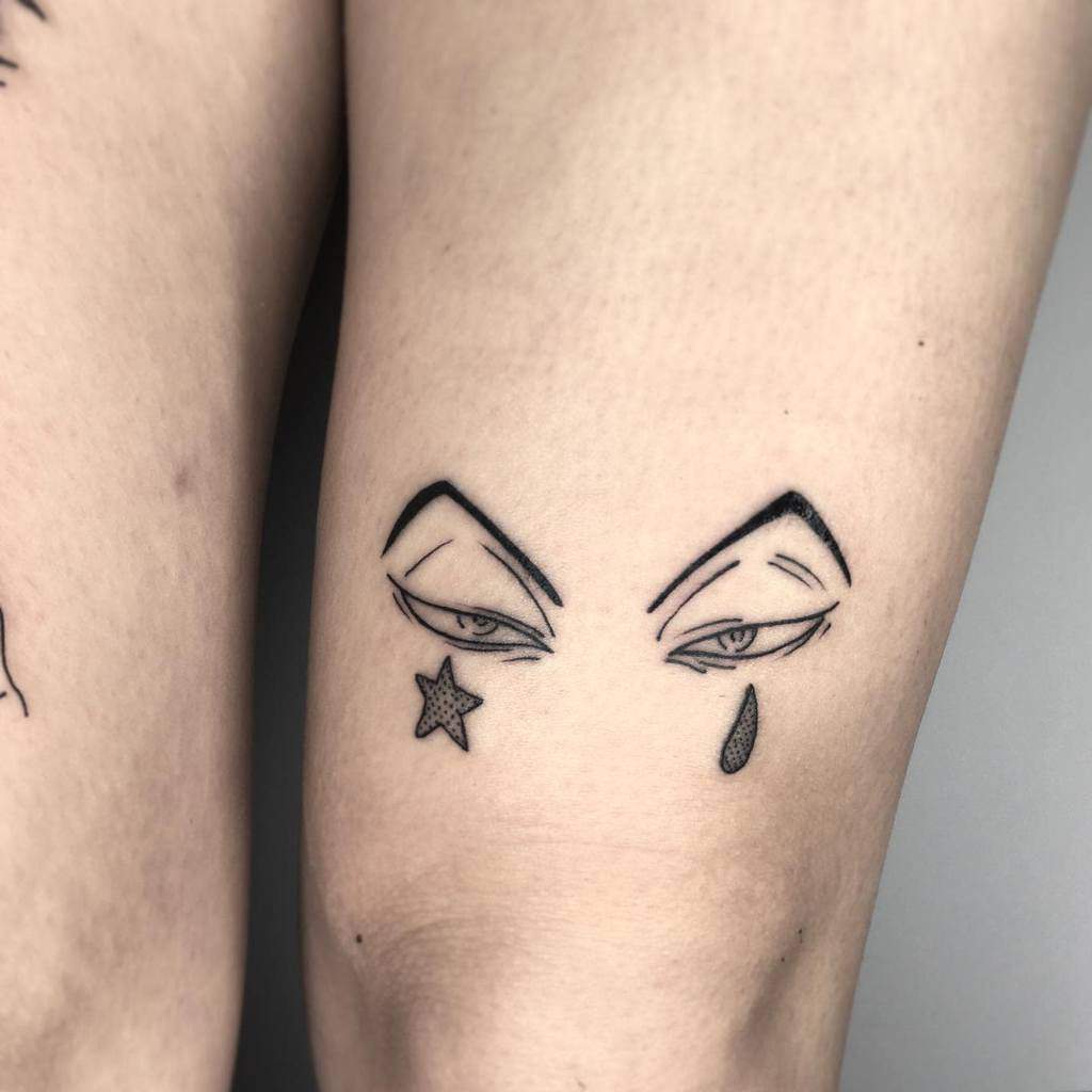 Clean and minimalistic tattoo design showcasing Hisoka's iconic eyes with his signature star and tear drop marks, perfectly capturing his enigmatic personality from Hunter x Hunter