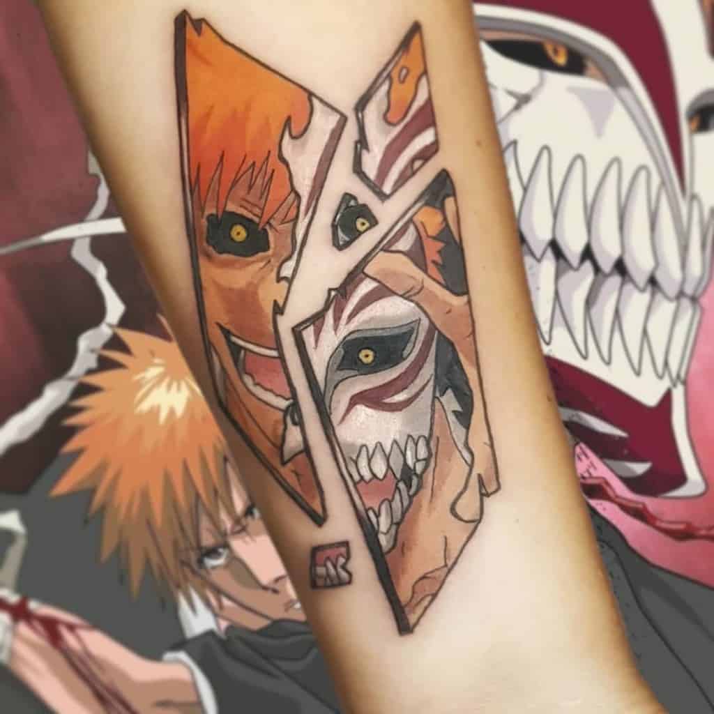 Colorful tattoo of Ichigo Kurosaki from Bleach, with shattered glass revealing his Hollow form, featuring intense golden eyes and sharp teeth