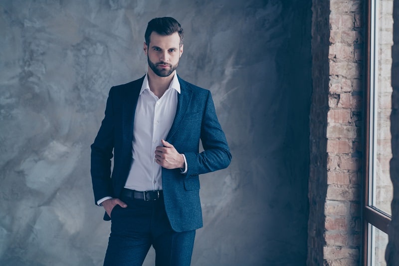 Portrait,Of,Minded,Entrepreneur,Looking,Touching,His,Modern,Jacket,Blazer