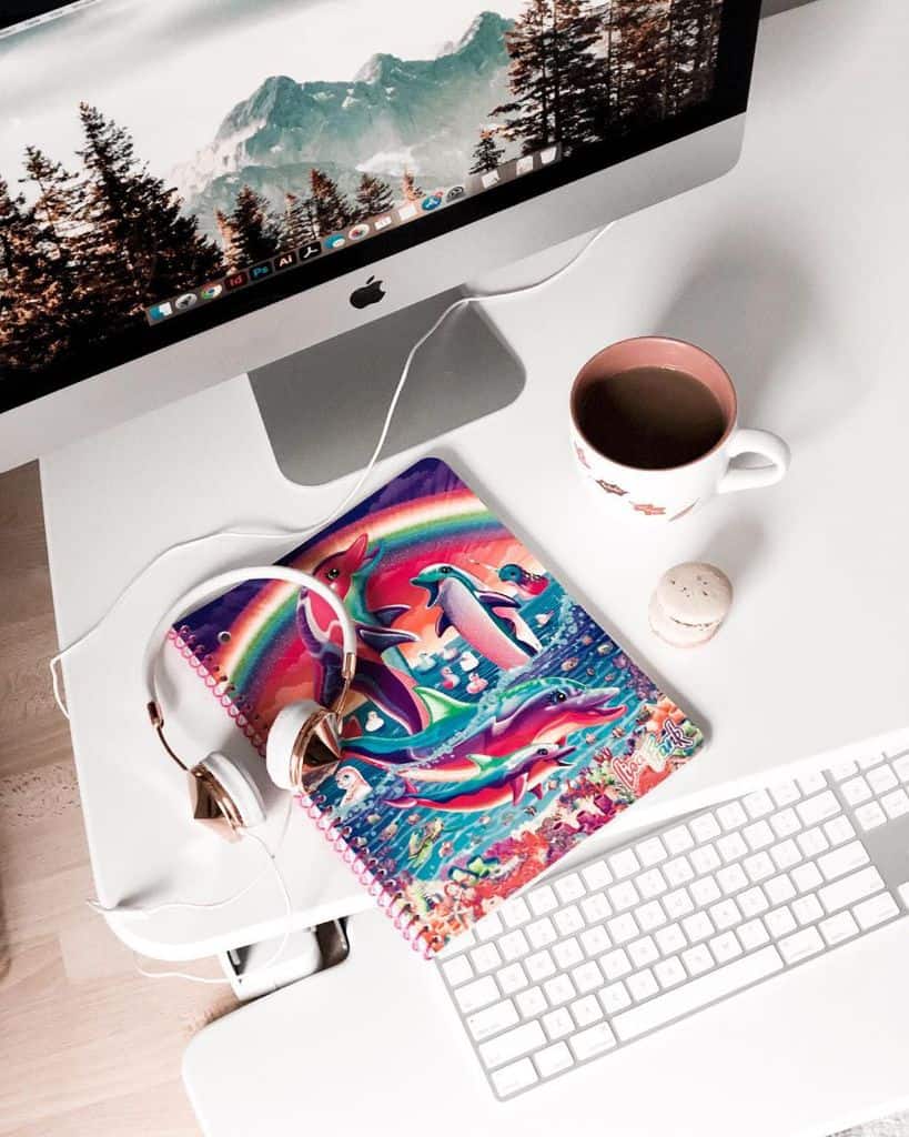 imac desk colorful notebook