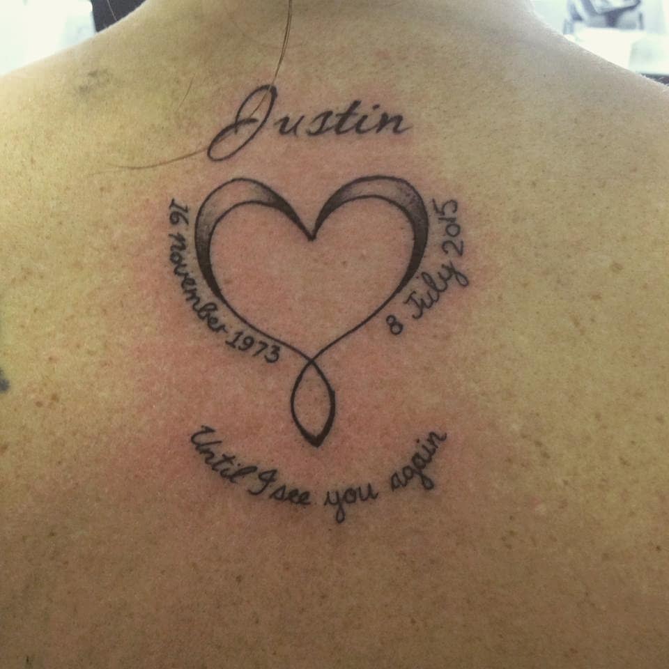 Heart tattoo with "Justin" dates "16 November 1973 - 8 July 2015" and text "Until I see you again" intertwined with an infinity symbol