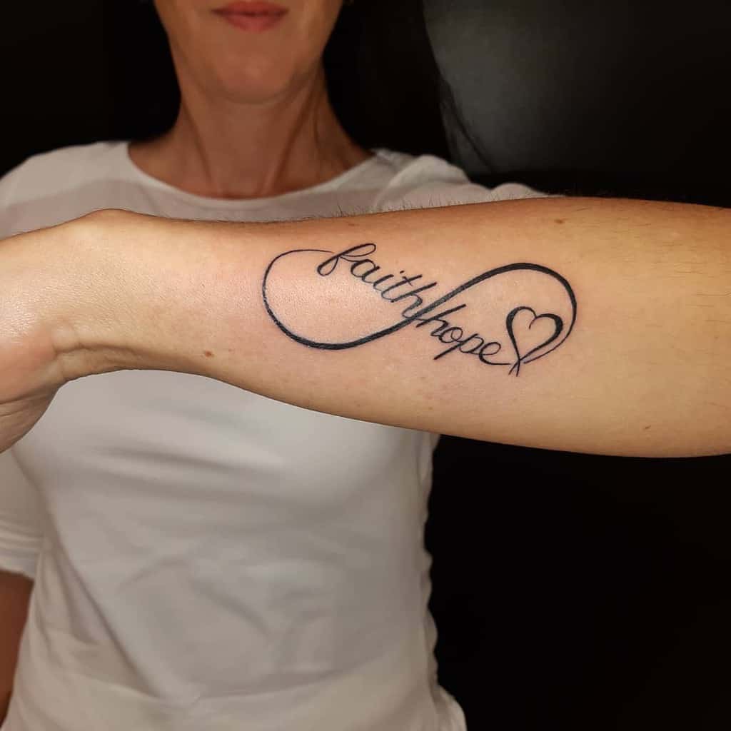 Tattoo with the words "faith hope" and a heart symbol