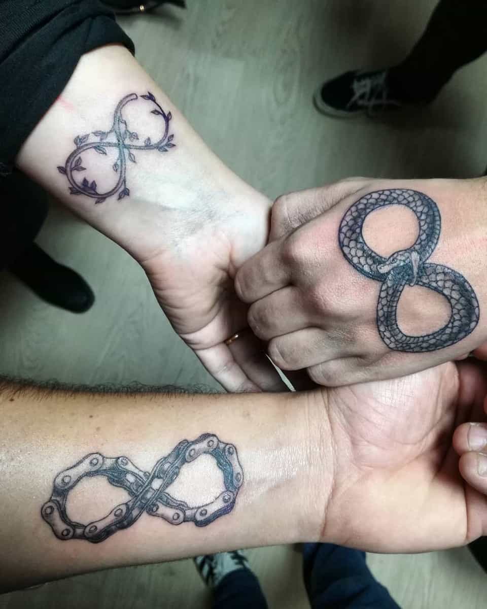 Three wrists with infinity symbol tattoos featuring unique designs