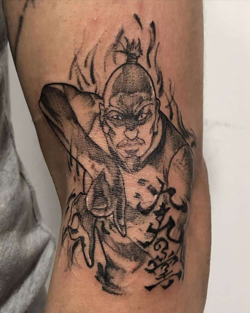 Dynamic Isaac Netero tattoo from Hunter X Hunter, featuring bold black ink, fiery energy details, and Japanese calligraphy accents