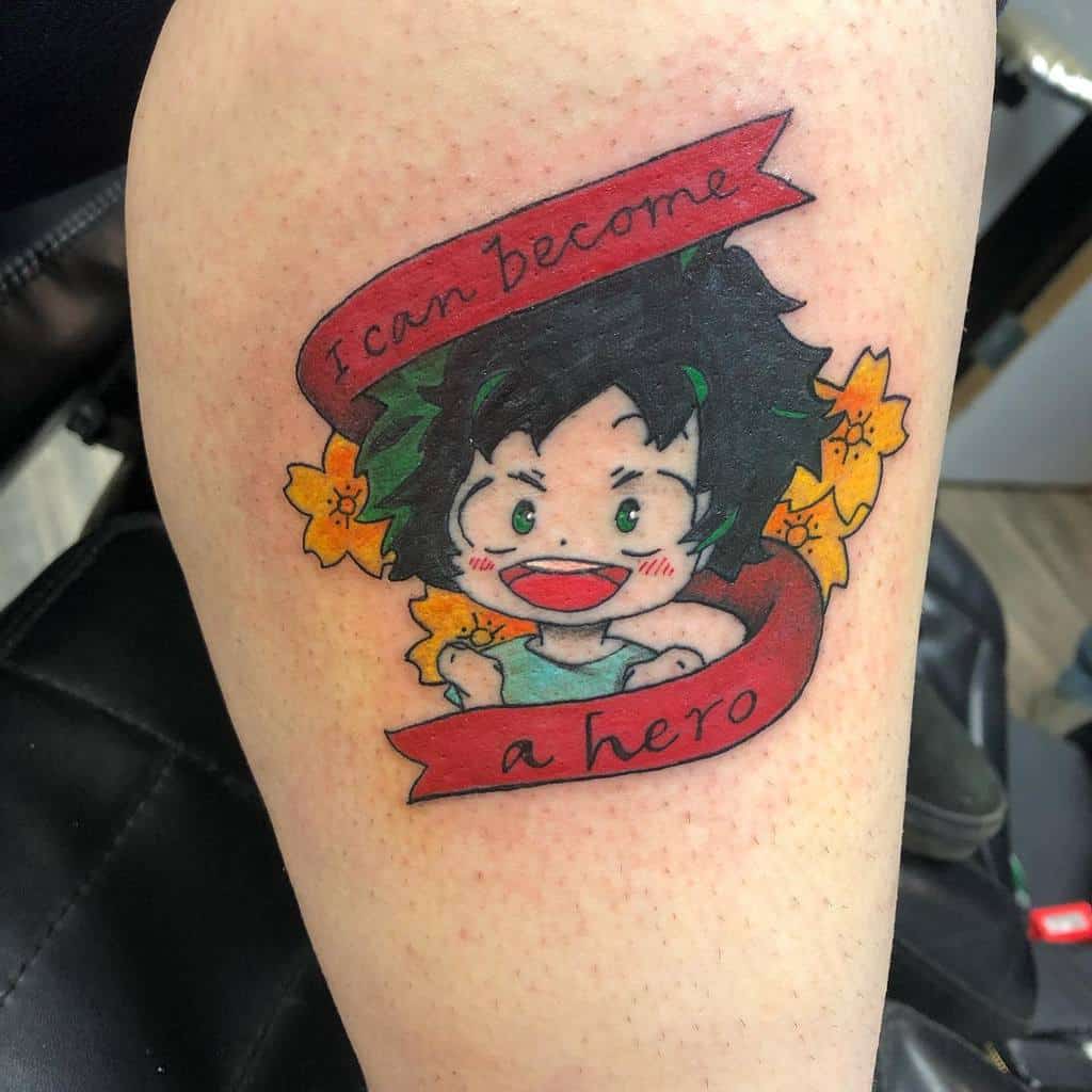 Colorful tattoo of young Izuku Midoriya from My Hero Academia, surrounded by yellow flowers with a red ribbon reading 'I can become a hero'