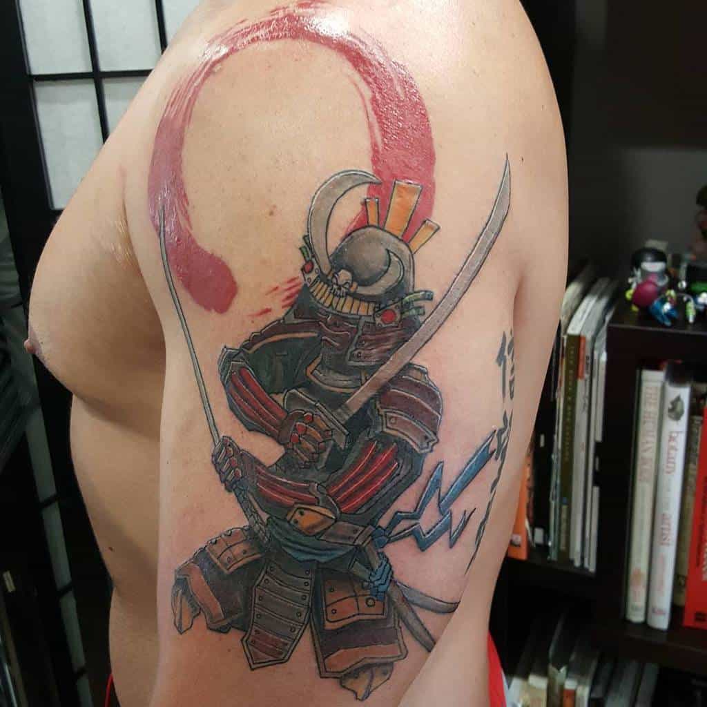 Vibrant upper arm tattoo of a samurai in colorful armor, wielding a katana, with a bold red brushstroke circle in the background