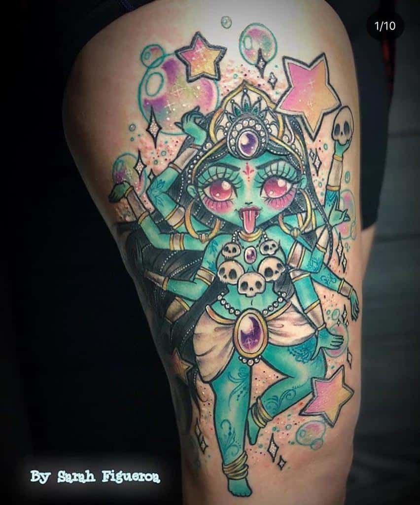 Colorful and playful tattoo of Kali with multiple arms, a third eye, skulls around her neck, and stars and bubbles in a vibrant, whimsical style