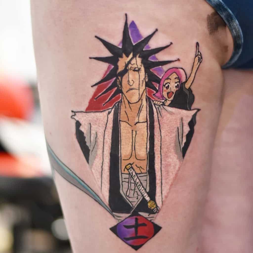 Colorful tattoo of Kenpachi Zaraki and Yachiru Kusajishi from Bleach, featuring Kenpachi’s spiked hair and eyepatch with Yachiru playfully in the purple and red diamond background