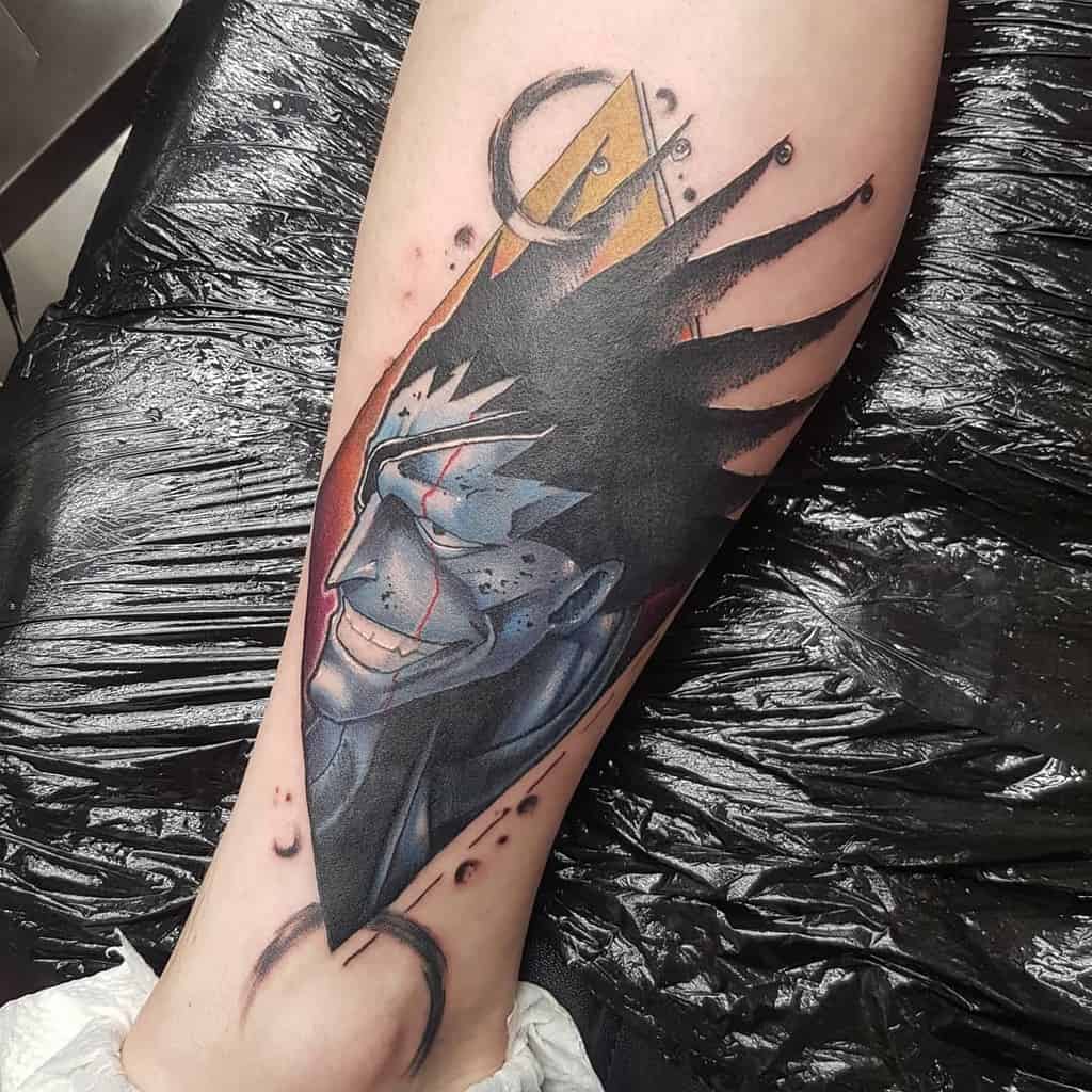 Detailed color tattoo of Kenpachi Zaraki from Bleach, featuring his spiked hair, scars, and intense grin with a bold diamond background