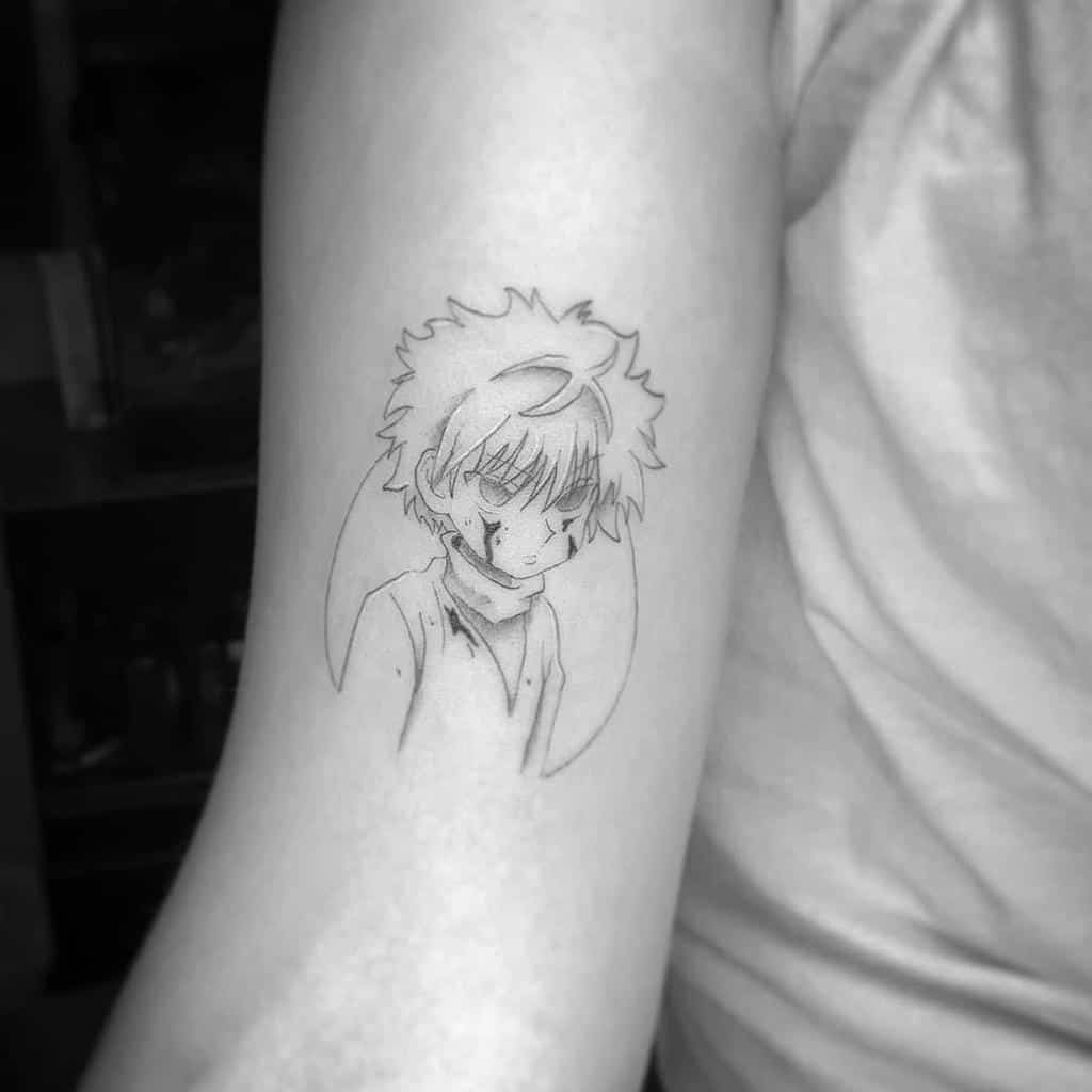 Monochrome Killua Zoldyck tattoo from Hunter X Hunter, featuring a somber expression, battle scars, and a clean circular background
