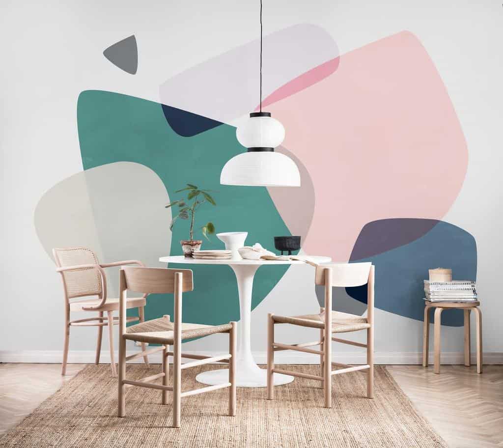 abstract color wall mural small dining table and wood chairs