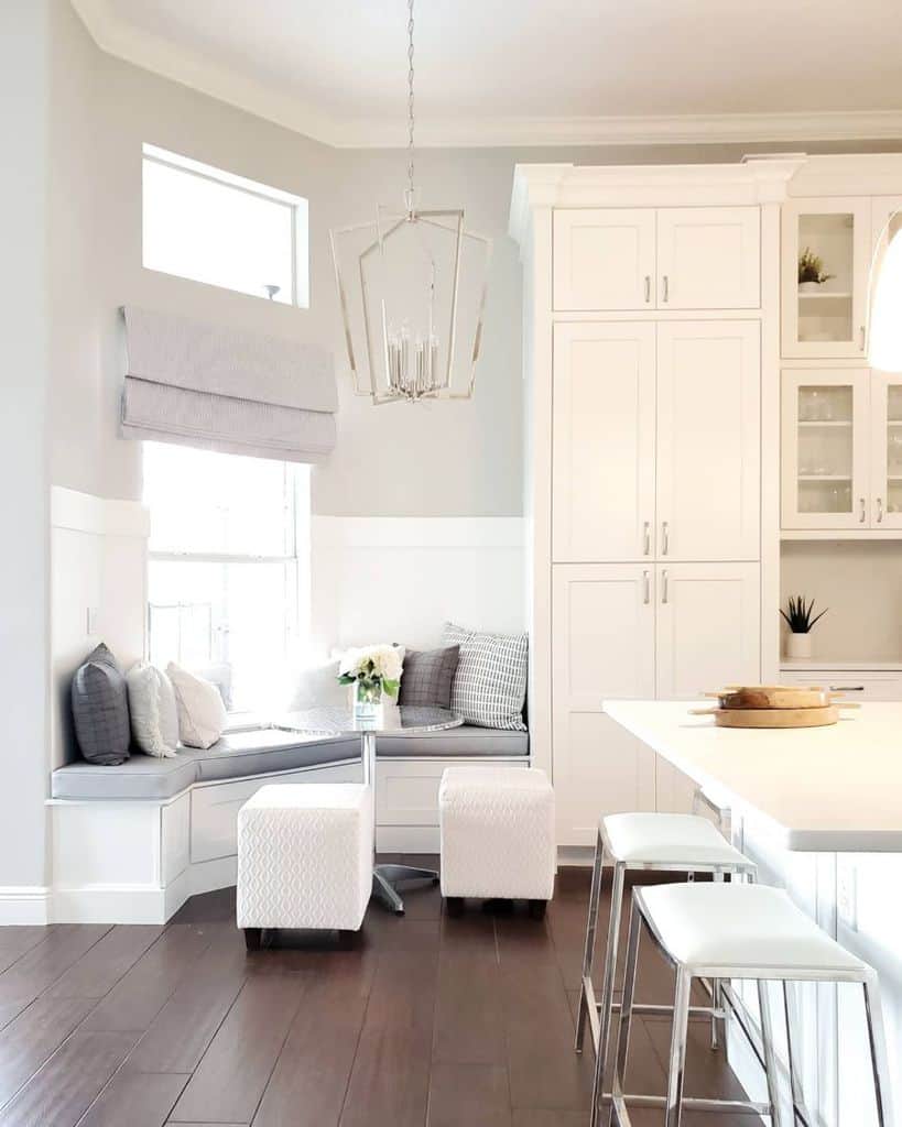 large white kitchen corner bench seat modern silver chandelier
