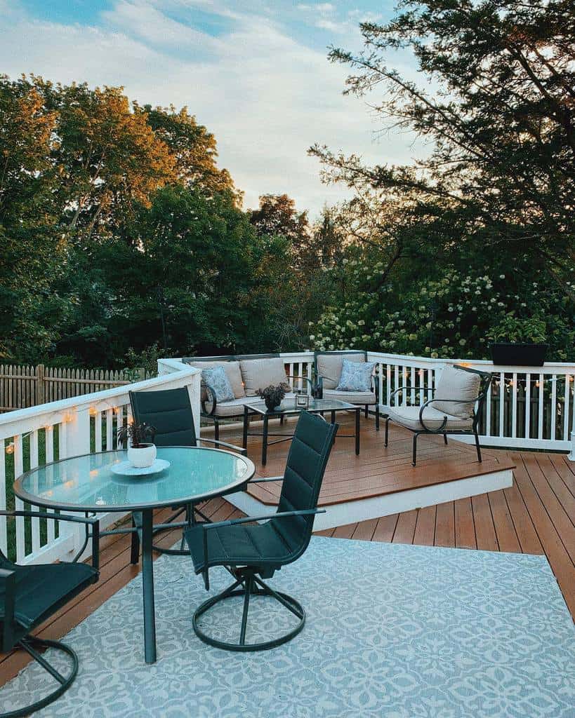 large outdoor tiered wood deck outdoor dining set
