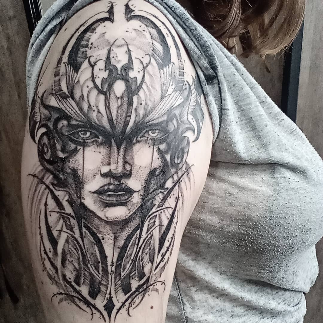 Detailed black and white tattoo of Morgana from League of Legends, showcasing her fierce, ethereal face