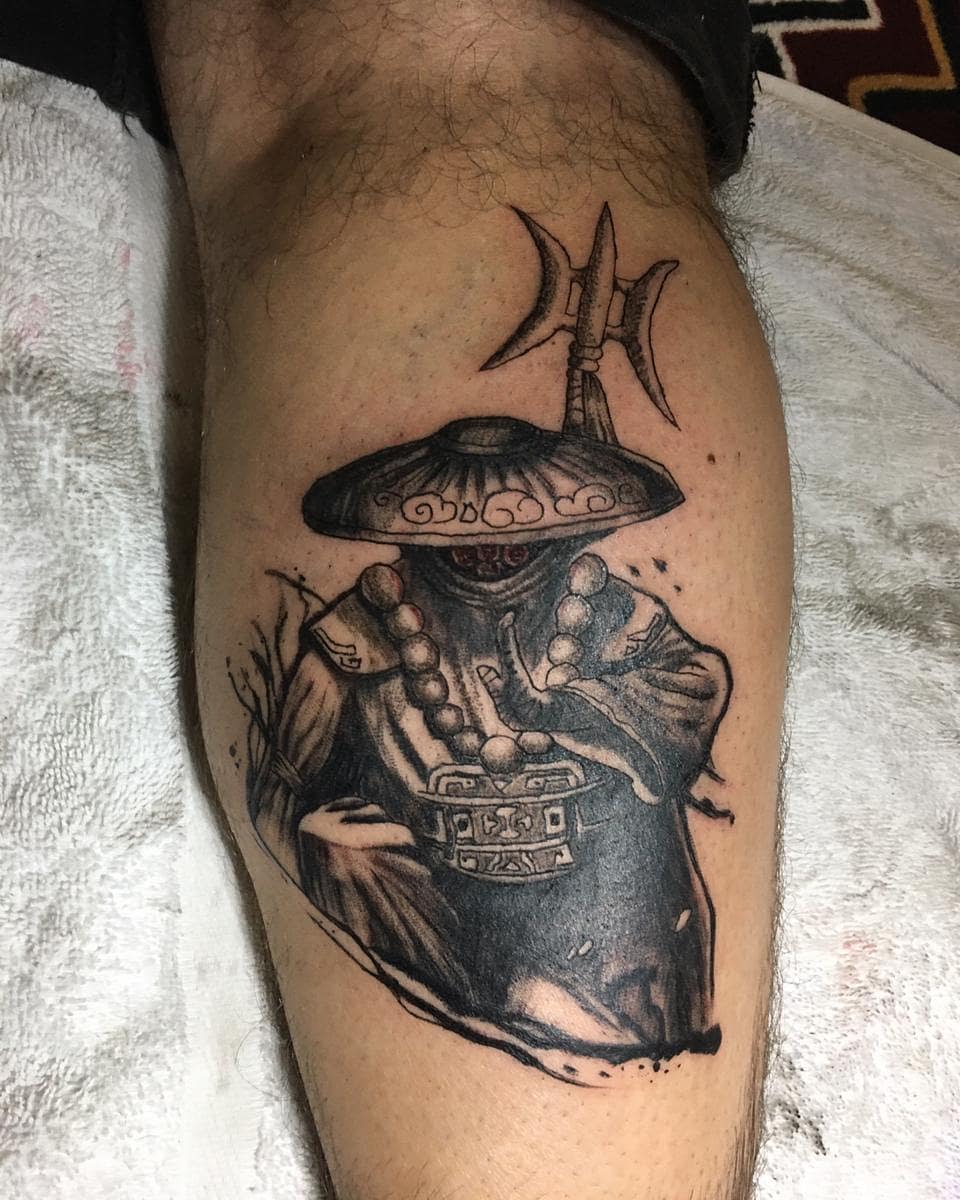 Black and white tattoo of Jhin in his Blood Moon skin from League of Legends, featuring his mask and ceremonial attire