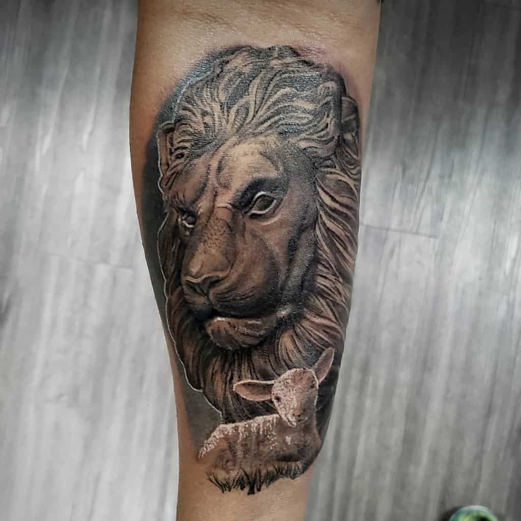 Tattoo of a lion's face and a lamb on a person's forearm, symbolizing strength and gentleness