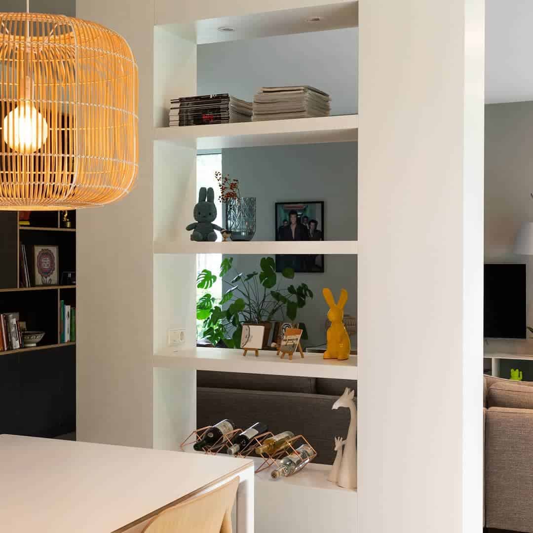 white wall divider with shelves