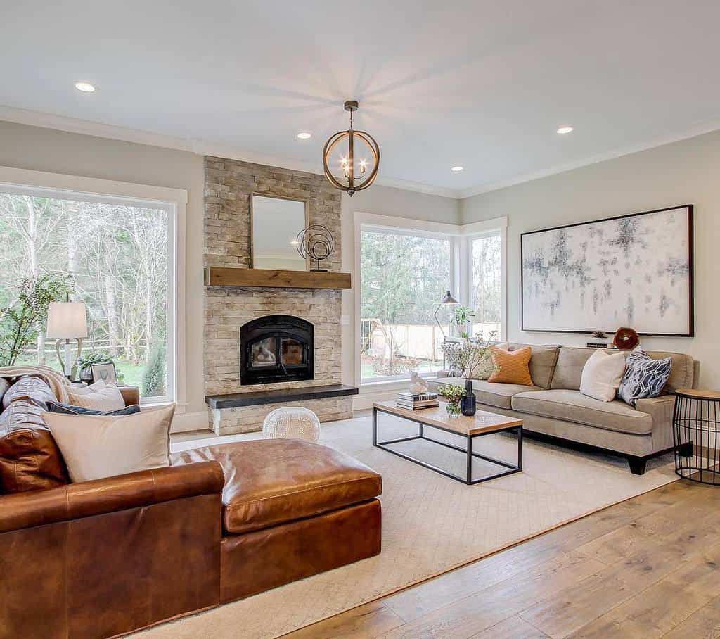 modern rustic living room stone fireplace tan leather sofa
