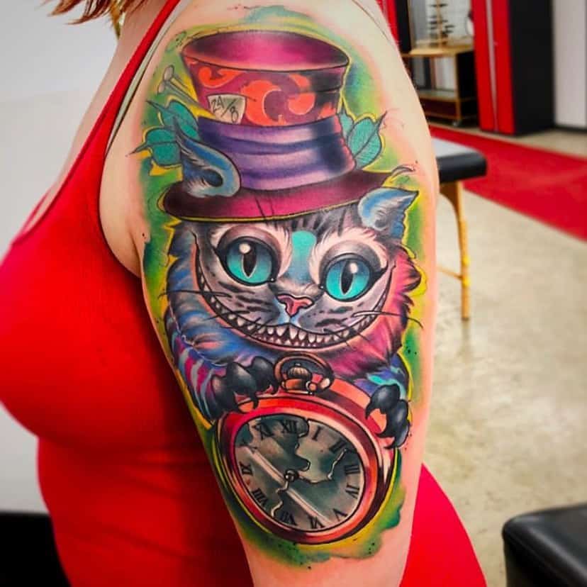 A vibrant tattoo of the Cheshire Cat wearing a Mad Hatter hat and holding a clock, with bold colors and intricate details that capture the whimsical essence of Wonderland