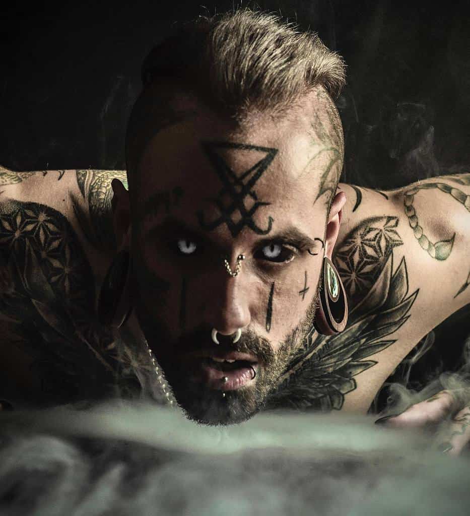 Male Tribal Face Tattoo