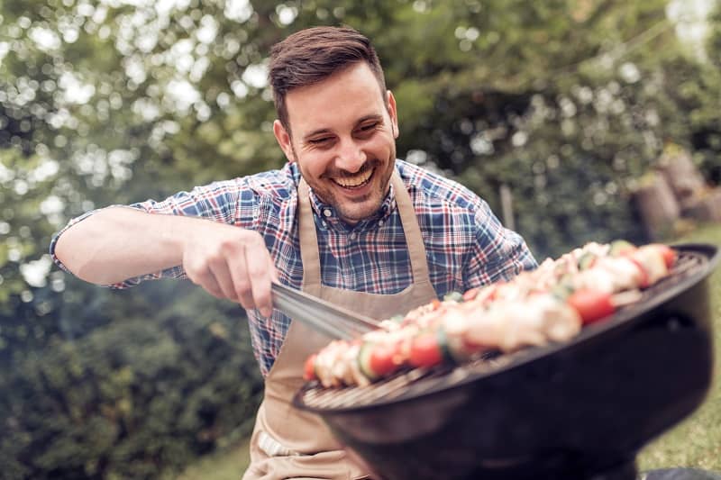 Man-Doing-Barbecue-Best-Outdoor-Hobby-For-Men