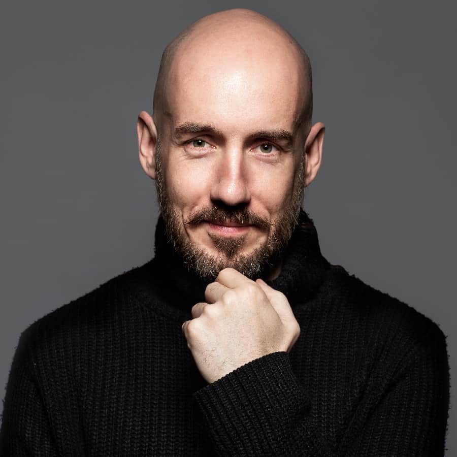 Man In 40s With Shaved Head