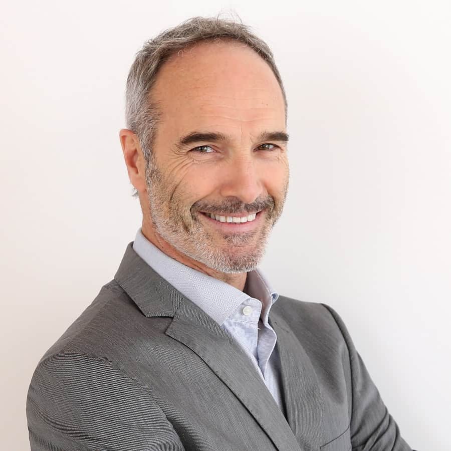 Man In Suit With Receding Hairline