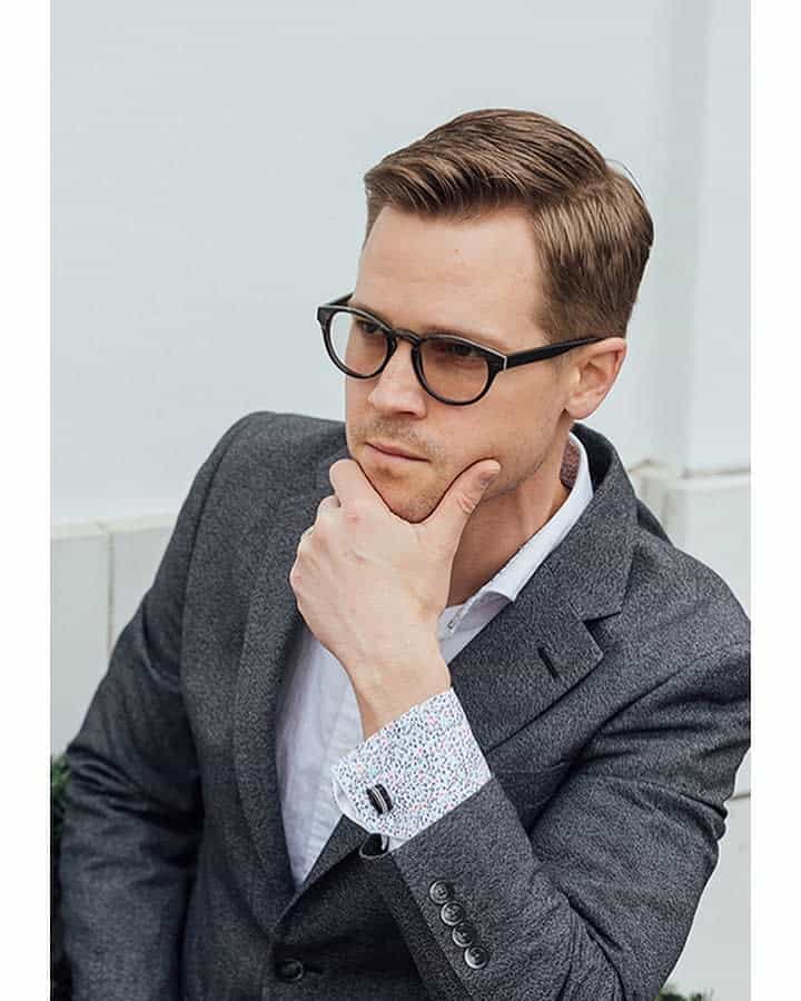 Man Wearing Glasses Ivy League Hairstyle