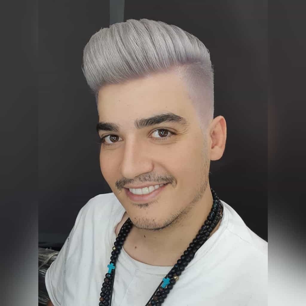 Man with blond highlights and facial hair-shahryar.aria