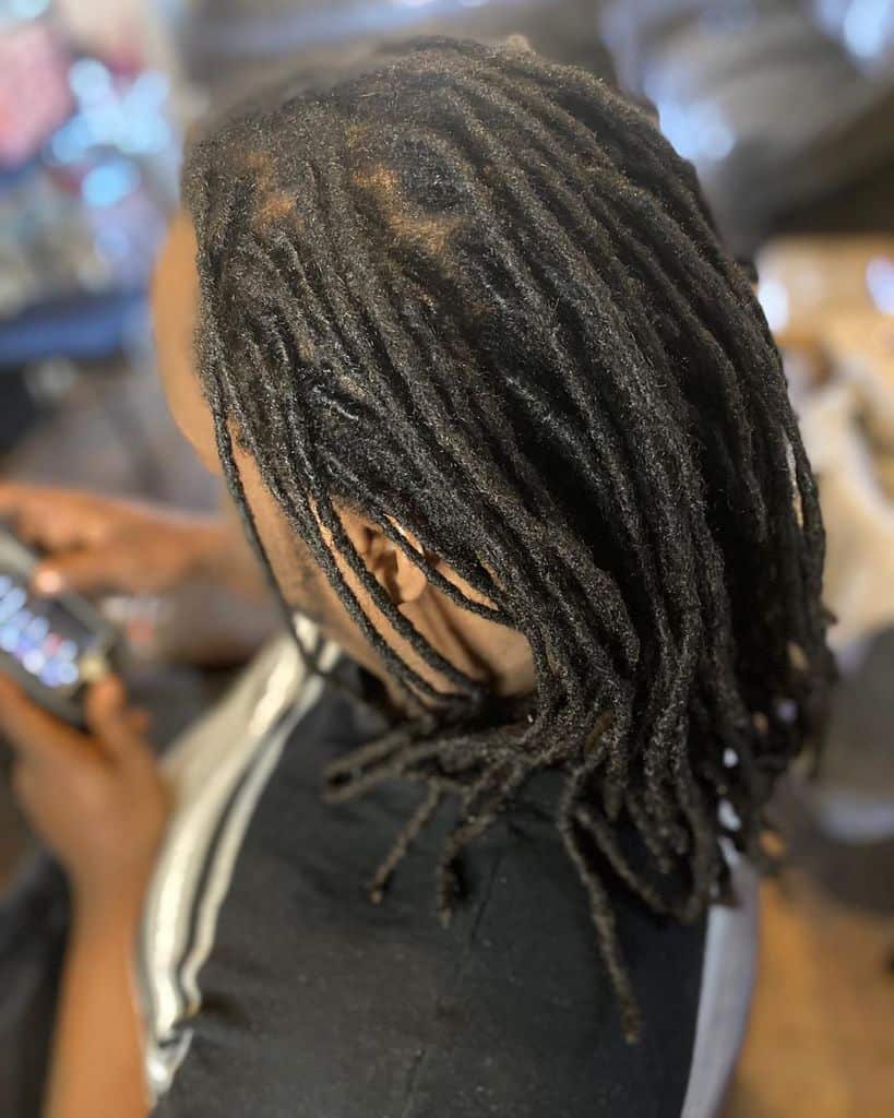 Man With Dreadlock Hairstyle Featuring Medium Length Dreads