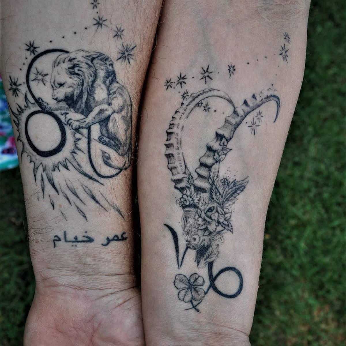 Lion tattoo on left forearm and Capricorn tattoo on right forearm.