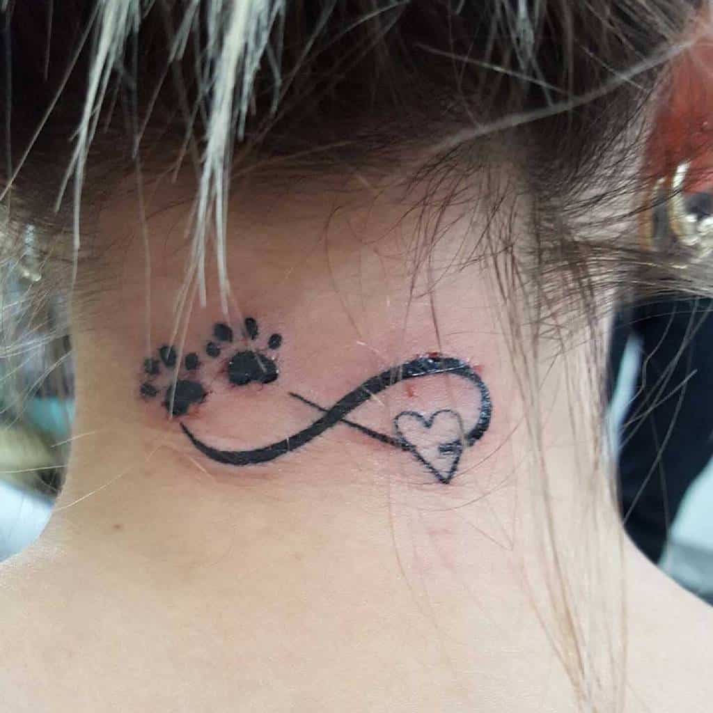 Infinity symbol tattoo on the back of neck with paw prints and a small heart