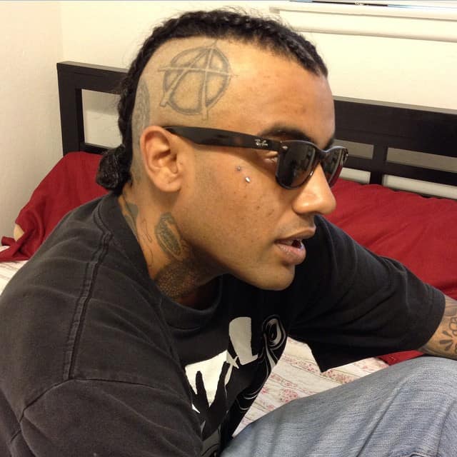 Men’s Hairstyles Featuring Long Mohawk Cornrows And Shaved Sides