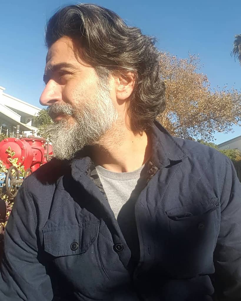 Mid Length Hairstyle Paired With Facial Hair