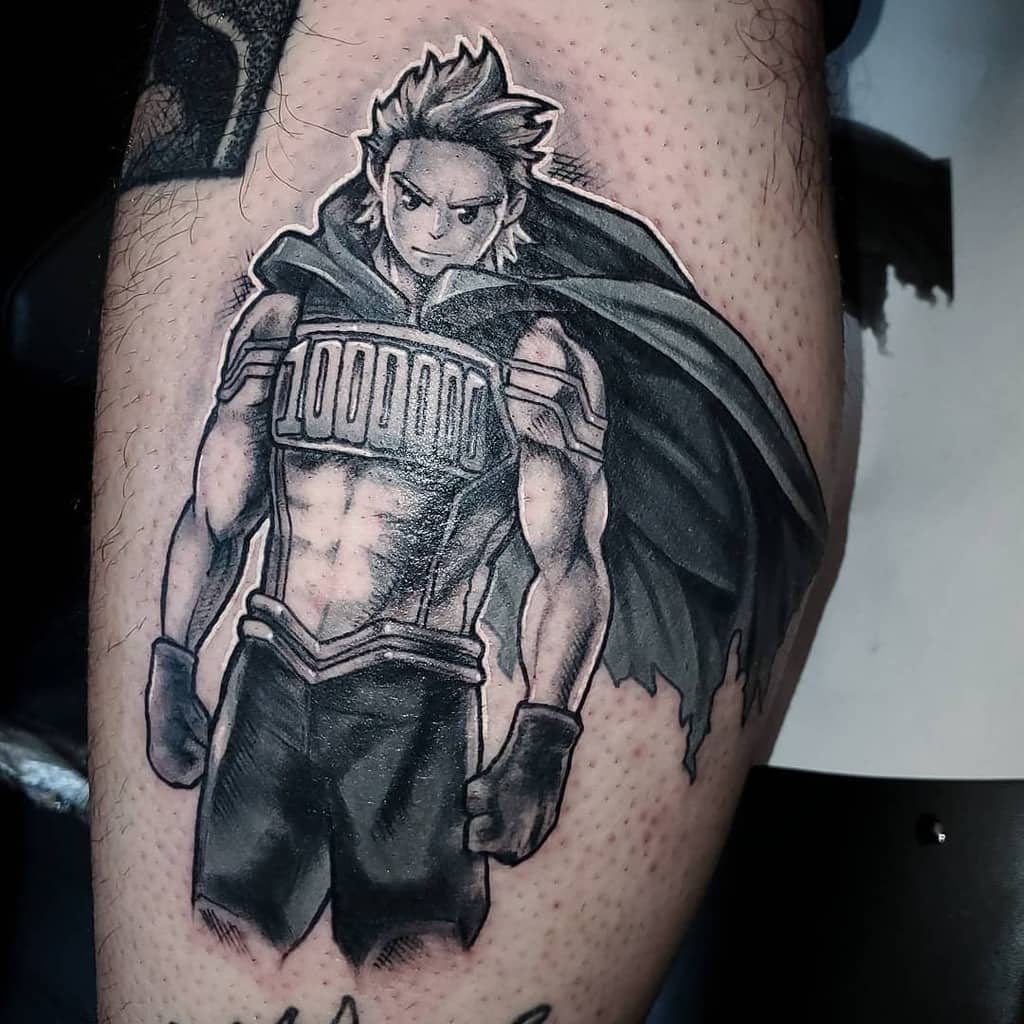 Black and grey tattoo of Mirio Togata from My Hero Academia, standing heroically with a determined expression, tattered cape, and '1000000' emblem