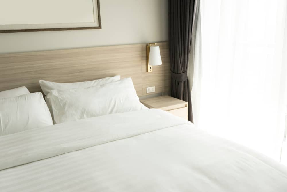 hotel style bed in modern bedroom