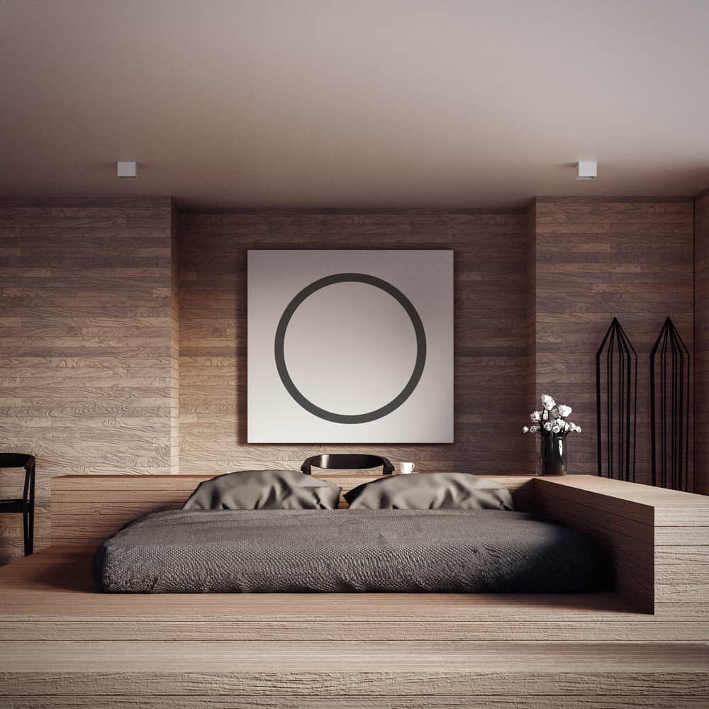 raised platform bed in wood bedroom