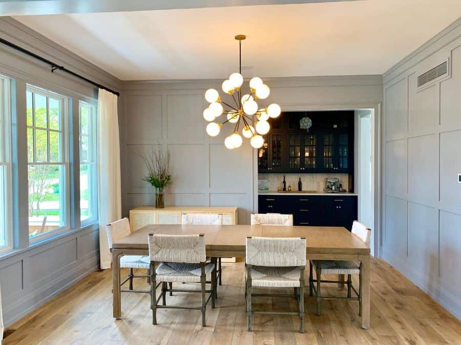 sputnik chandelier wood table and chairs gray walls