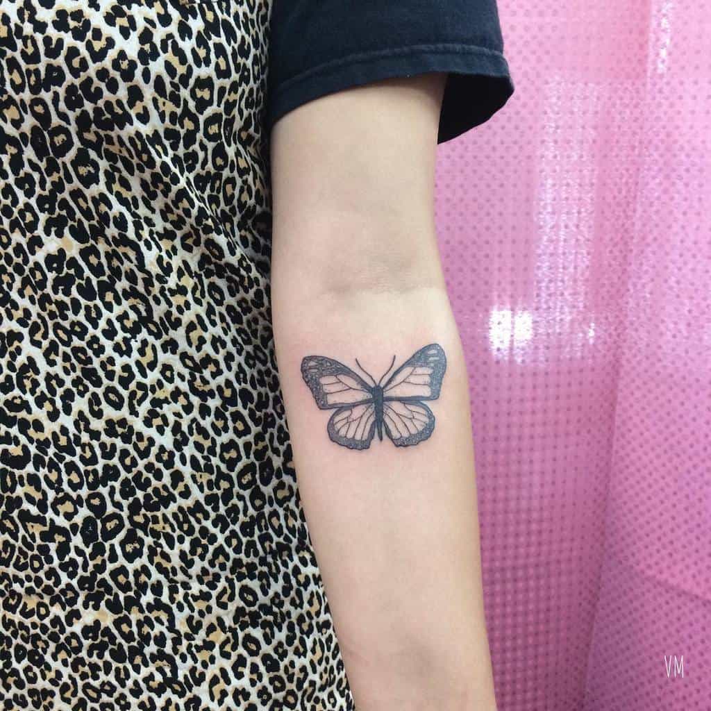 Monarch butterfly tattoo on the forearm