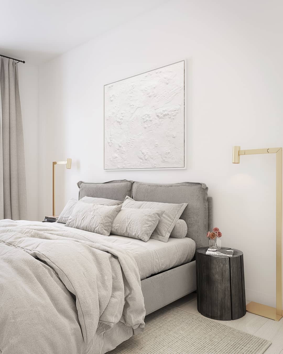 Modern white bedroom with gold floor lamps, textured wall art, and wooden log side table.