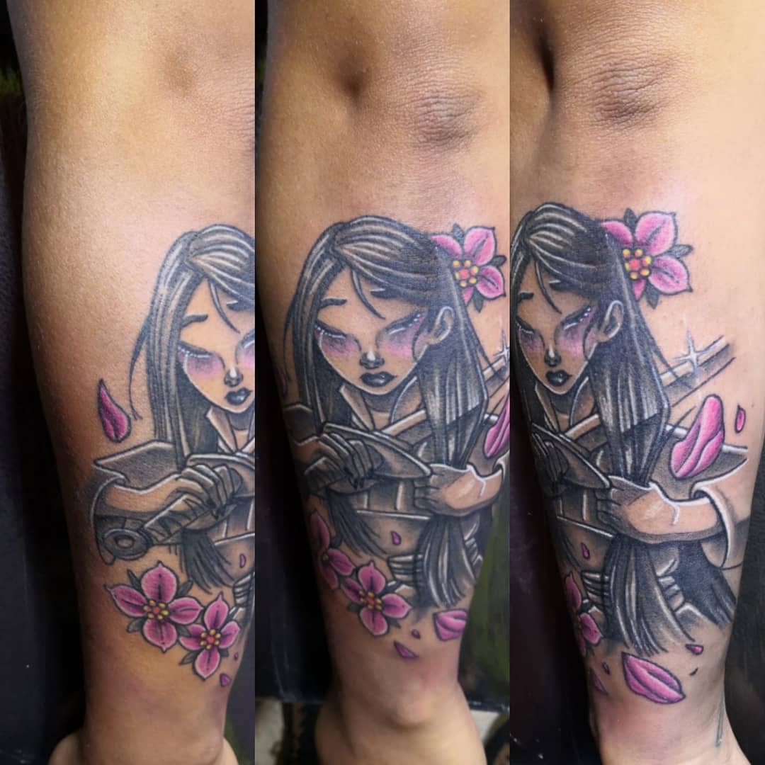 Tattoo of Mulan with flowers