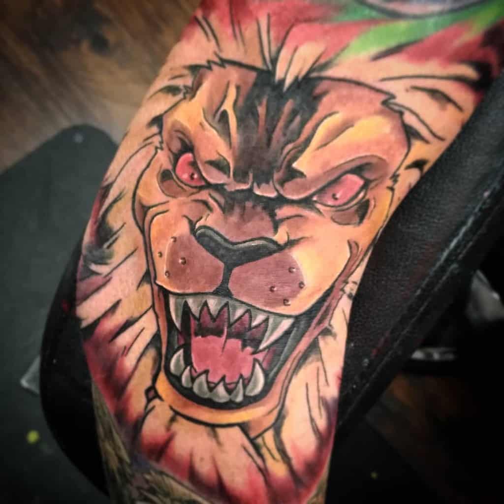 A bold and vibrant tattoo of Beast King from One Punch Man, featuring intense red eyes, sharp fangs, and dynamic shading for a fierce look