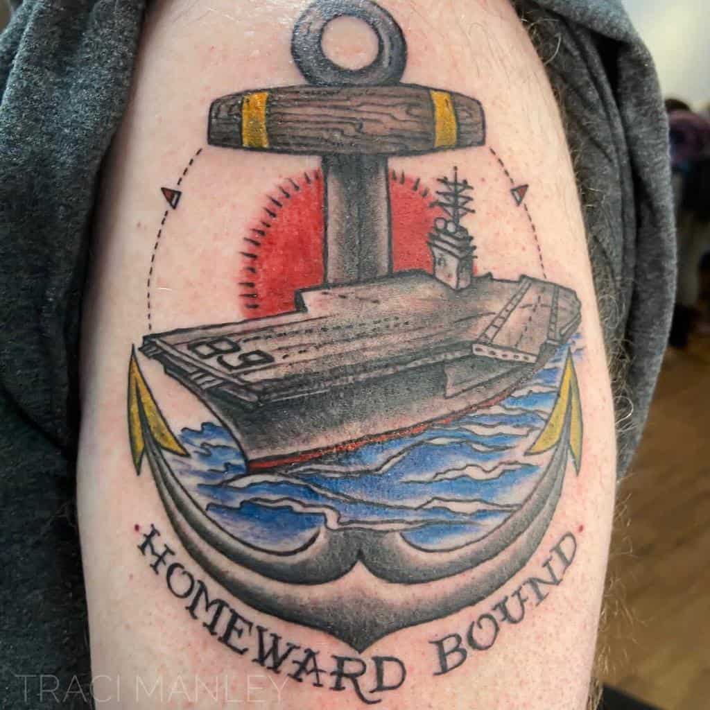 Tattoo of a navy anchor with a ship and waves, surrounded by "Homeward Bound" text