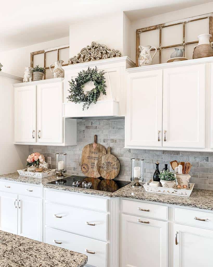 rustic kitchen white cabinets gray stone backsplash